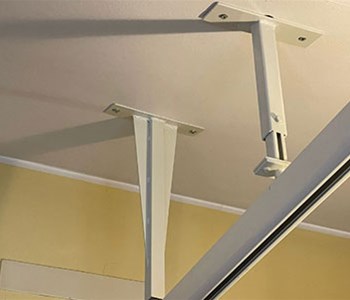 Sollevatore per disabili a soffitto